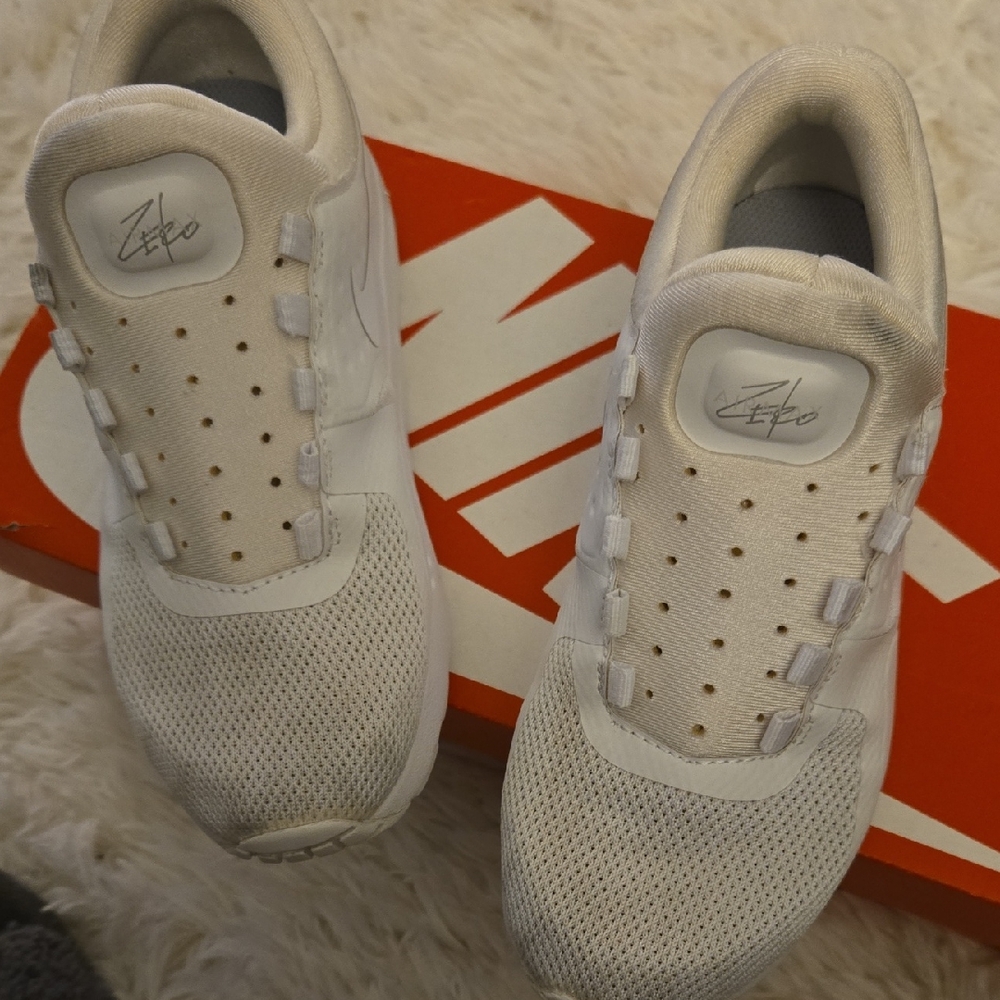 Nike White Mesh Slip-On Sneakers